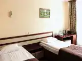 Двухместный номер с 2 отдельными кроватями Первая категория однокомнатный (твин) стандарт