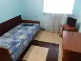 Одноместный номер эконом-класса с общей ванной комнатой