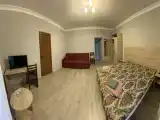 Трёхместный номер с двумя кроватями вместе или раздельно + диван