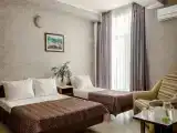 Трёхместный номер полулюкс с балконом