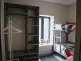 Двухместный номер с 2 отдельными кроватями с общей ванной комнатой