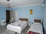 Трёхместный номер с видом на море
