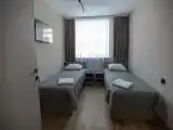 Двухместный номер с 2 отдельными кроватями эконом (санузел и душевая на этаже)