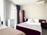 Трёхместный номер с балконом