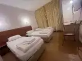 Двухместный номер с 2 отдельными кроватями и доп. местом