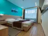 Двухместный номер с 2 отдельными кроватями стандарт 1-й категории