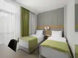Трёхместный номер Полулюкс с двумя раздельными кроватями
