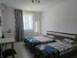 Трёхместный номер с балконом