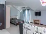 Четырёхместный номер Студия с балконом