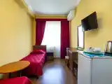 Четырёхместный номер Двухкомнатный четырехместный люкс с балконами