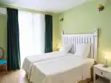 Двухместный номер с 2 отдельными кроватями стандарт сьют Сёра