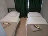 Двухместный номер с 2 отдельными кроватями с удобствами