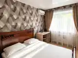 Двухместный номер с 1 кроватью Стандарт с двуспальной кроватью и душевой