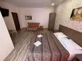 Четырёхместный номер Стандарт 2+2 с мини кухней 3 этаж