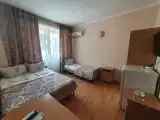 Трёхместный номер Делюкс