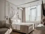 Трёхместный номер полулюкс с видом на горы