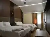 Четырёхместный номер 2 двуспальные или 4 односпальные кровати