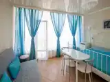 Четырёхместный номер студия с балконом астра 4