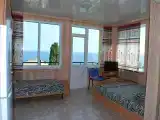 Трёхместный номер люкс с видом на море