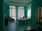 Трёхместный номер люкс с видом на горы