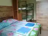 Четырёхместный номер с двуспальной кроватью