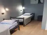 Двухместный номер с 2 отдельными кроватями "Эконом" с общим душем и туалетом