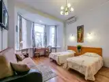 Четырёхместный номер DELUXE Четырёхместная комната категории "Полулюкс" для 4-х взрослых
