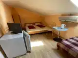 Трёхместный номер мансарда