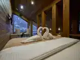 Четырёхместный номер двухуровневый панорамный люкс