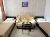 Трёхместный номер с односпальными кроватями