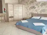 Трёхместный люкс с видом на море и горы