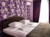 Трёхместный номер с видом на сад