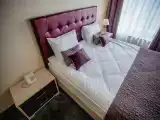Трёхместный номер полулюкс с сауной
