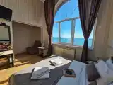 Трёхместный номер стандарт с видом на море