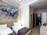 Двухместный номер с 2 отдельными кроватями стандарт