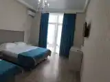 Трёхместный номер с балконом