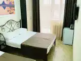 Трёхместный номер делюкс