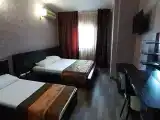 Трёхместный номер С 2х спальной и 1 спальной кроватями