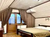 Трёхместный номер де-люкс