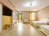 Четырёхместный номер Делюкс