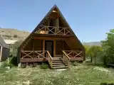 Уютный домик в горах в стиле А-фрейм