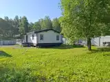 Дом в лесу с большой террасой