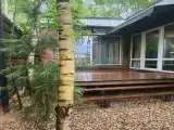 Дом (A) с сауной рядом с озером.