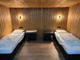 Номер в двухномерном коттедже с одноместными кроватями