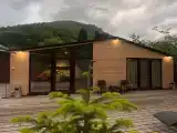 Домик в горах на берегу горной речки