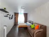 Студия с видом на ТЦ Планета