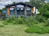Уютный домик ПРИГОРЬЕ с панорамными окнами и видом на горы