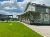 Уютный дом с большой верандой