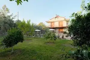 Charming 4-bedroom estate with WiFi, swimming pool and AC in enchanting Fethiye, Фетхие
