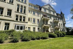 Vacation apartment with balcony overlooking the spa gardens of Bad Rothenfelde, Бад-Ротенфельде